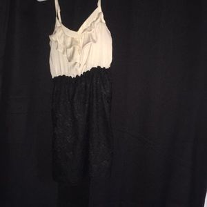 Black lace dress with cream ruffles top